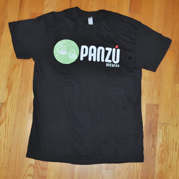 Black Panzu Brewery t-shirt with a green circular logo featuring a man holding a beer.